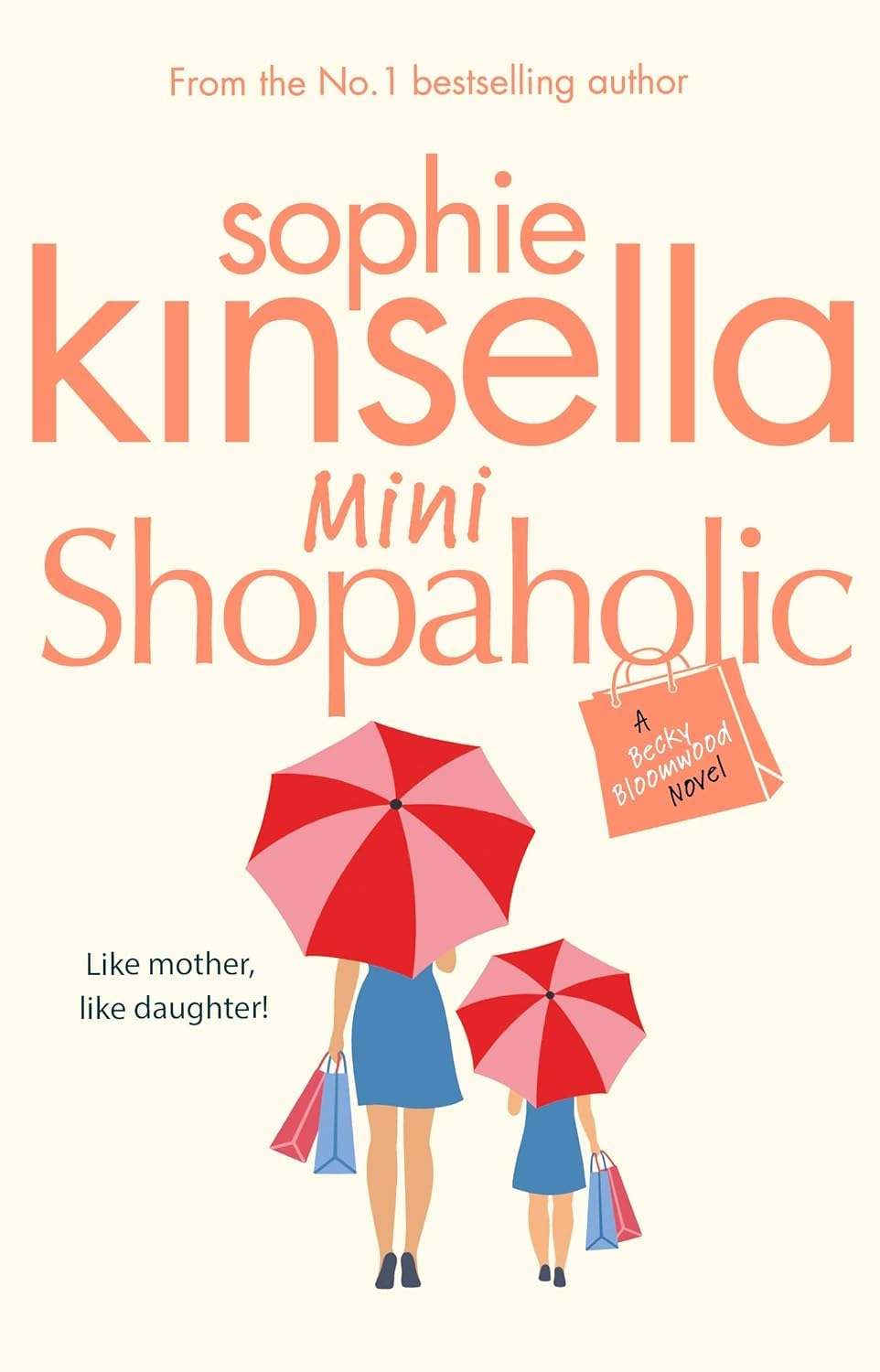 Close-up of The Secret Dreamworld of a Shopaholic and Shopaholic Abroad paperback covers from the 8-book set