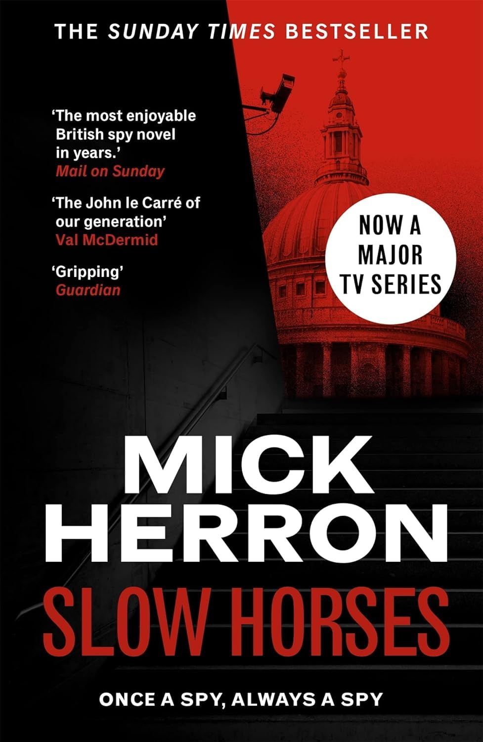 Angled view of the Slough House 8-book paperback set by Mick Herron highlighting cover art across the full collection.
