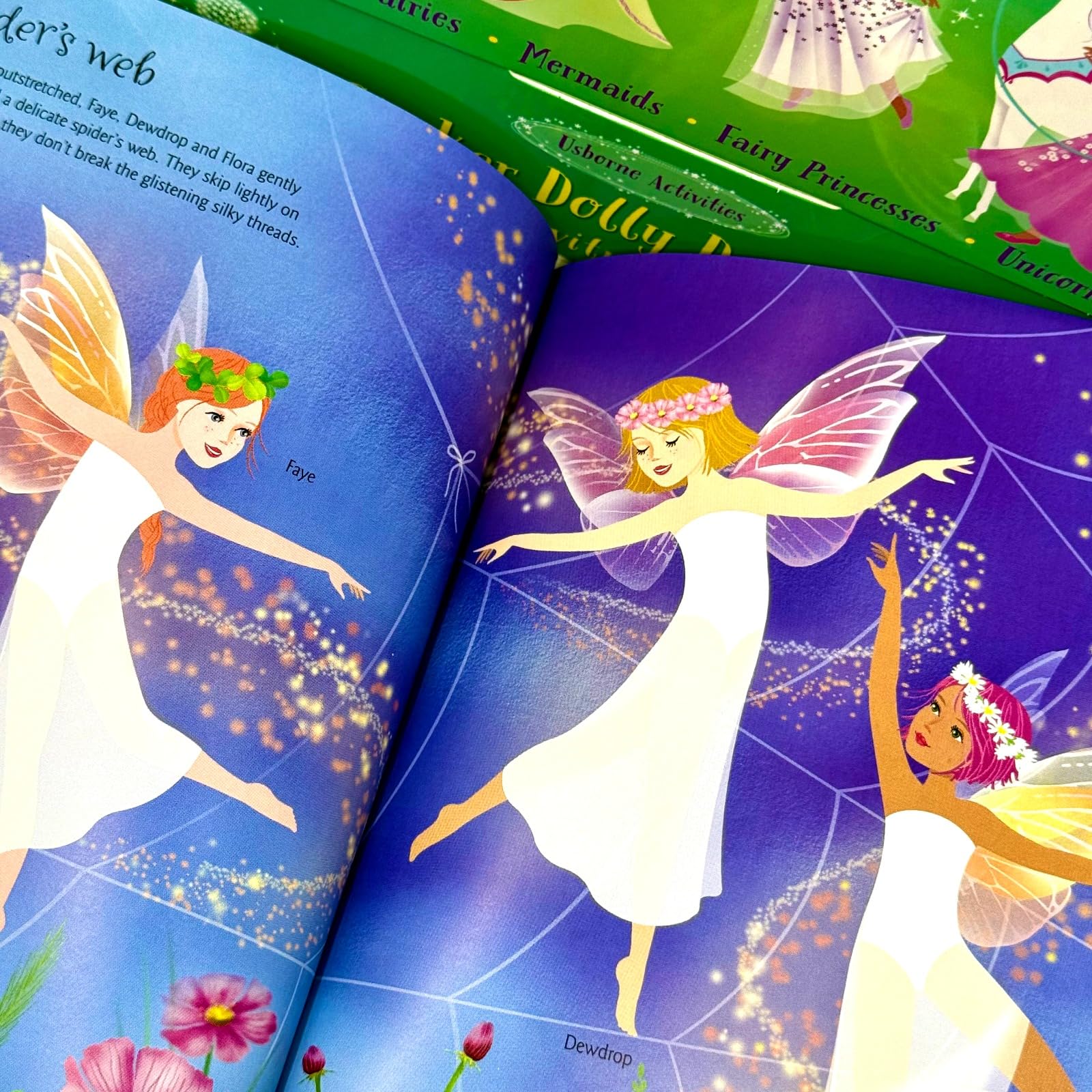 Inside page spread from the Sticker Dolly Dressing Dancing Fairies mini sticker book with a ballet-inspired scene and sticker sheet