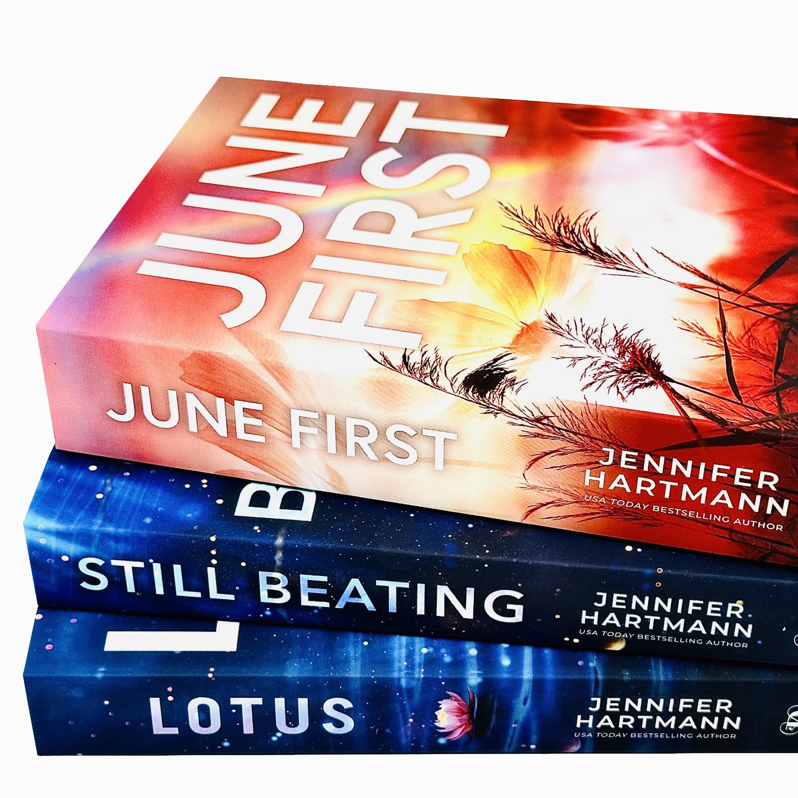 All three Jennifer Hartmann paperbacks fanned out to display the complete cover artwork of the set.