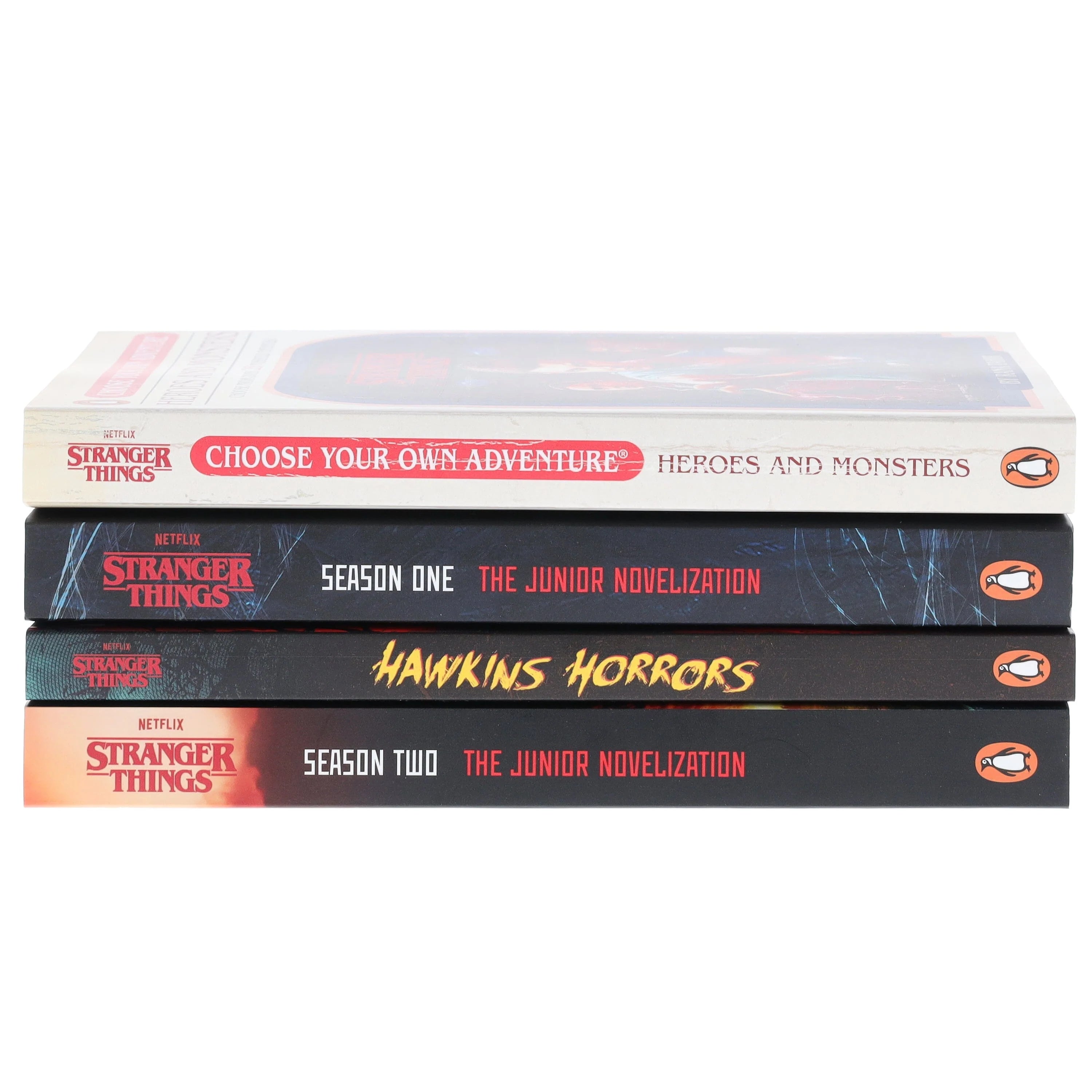 Spine view of the four Stranger Things paperback books stacked together showing titles and Netflix series branding