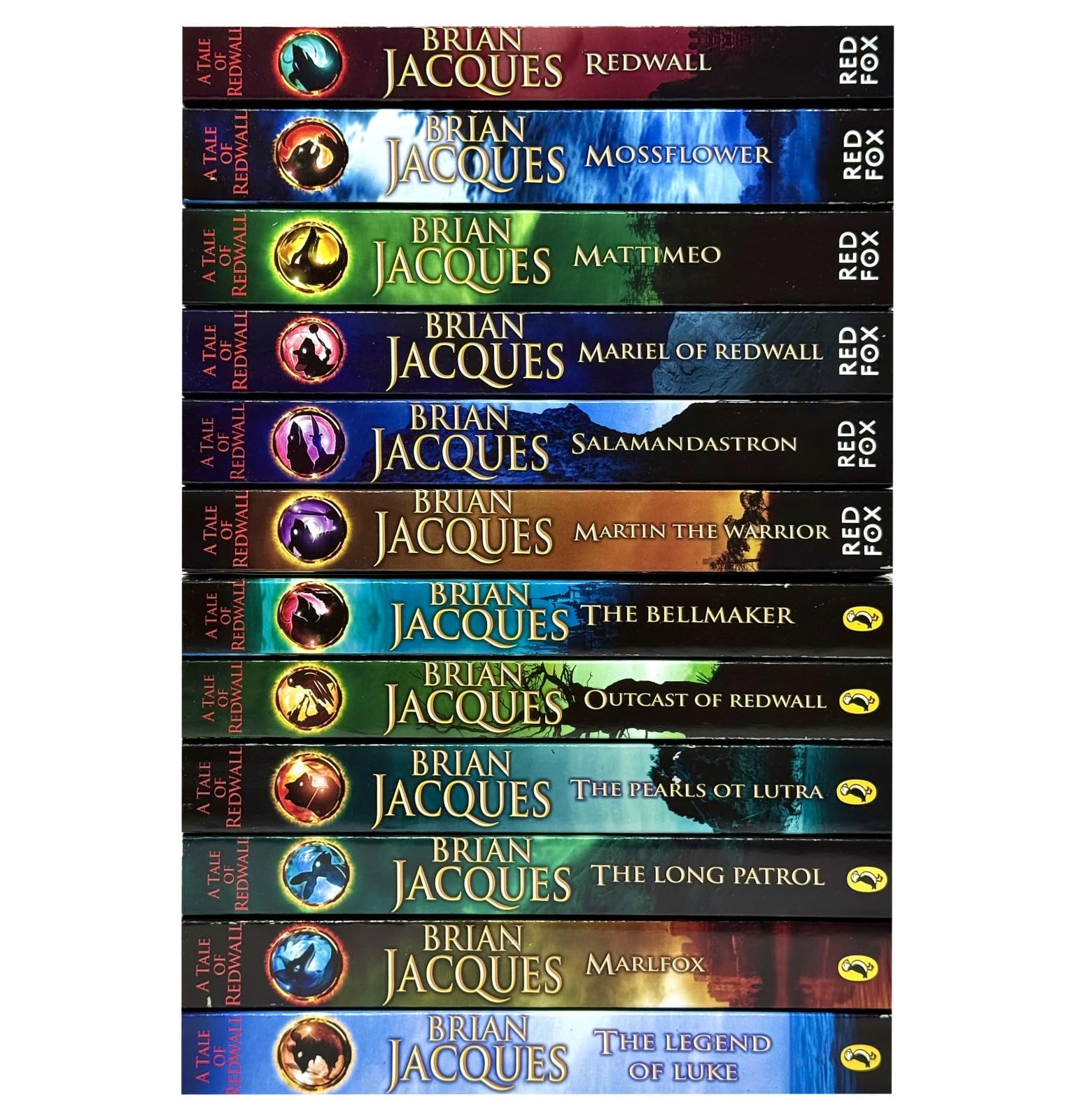 Redwall series 12 paperback books by Brian Jacques fanned out showing all titles in the set