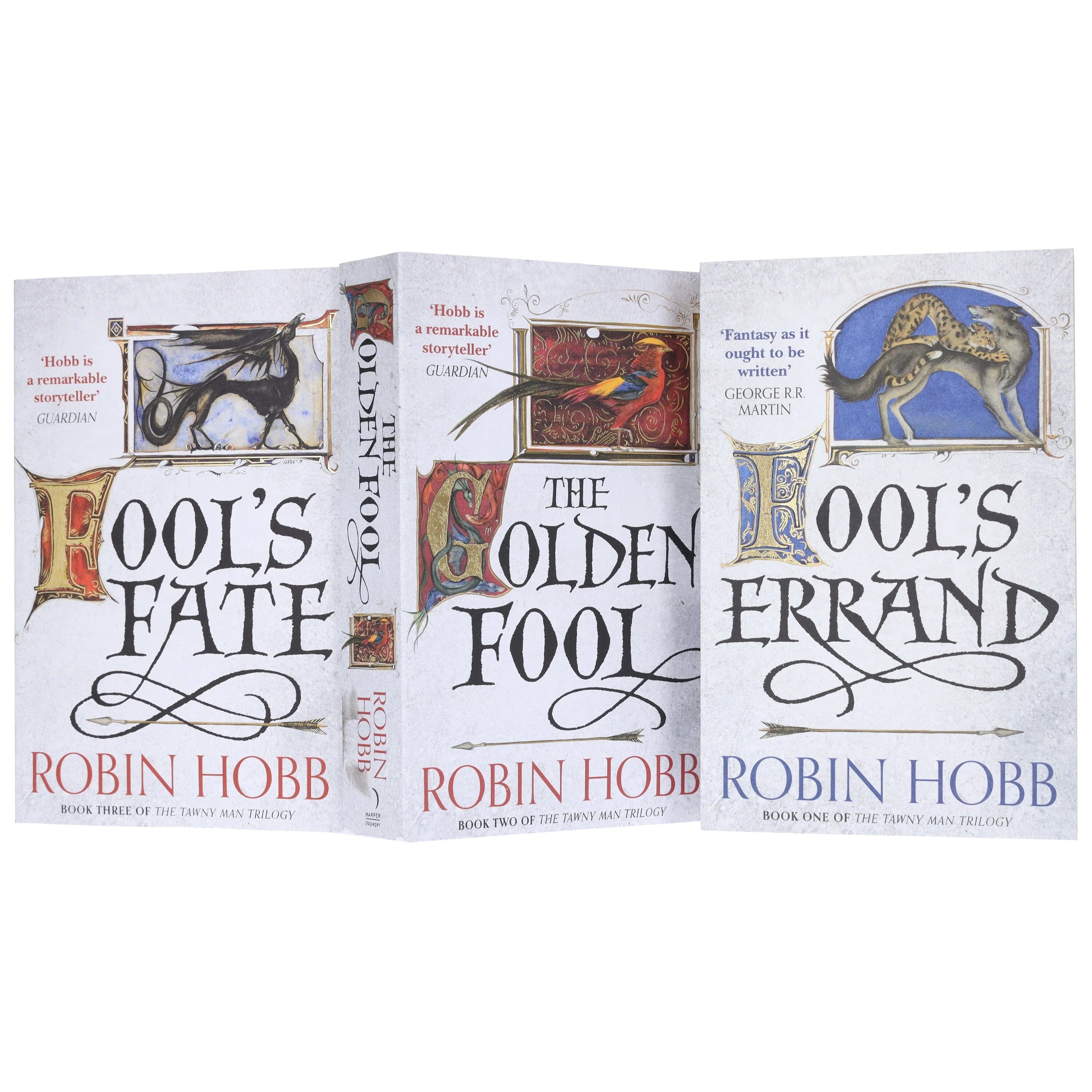 Close-up of The Tawny Man Trilogy paperback covers showing Fool's Errand, The Golden Fool, and Fool's Fate spines