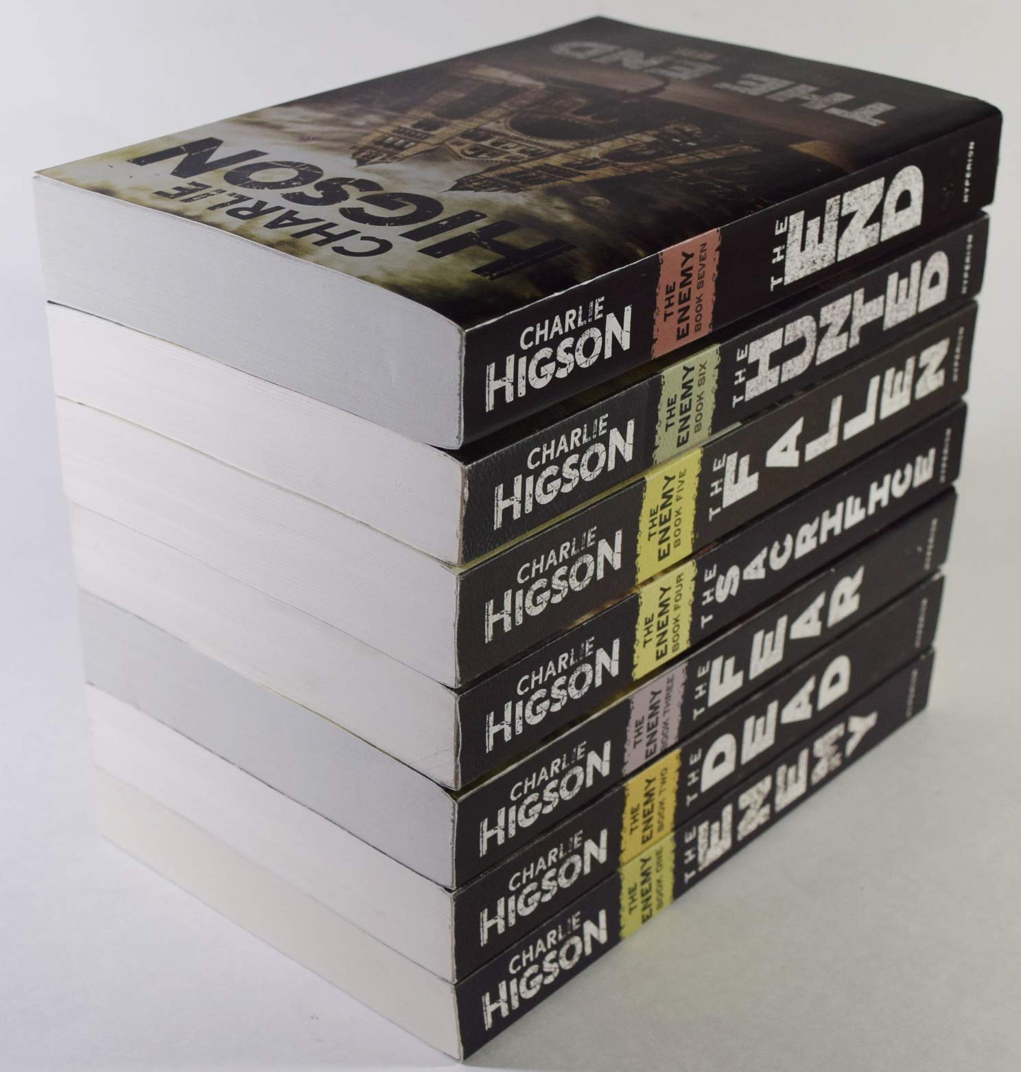 The Enemy Series 7 books fanned out showing spines of The Enemy, The Dead, The Fear, and more