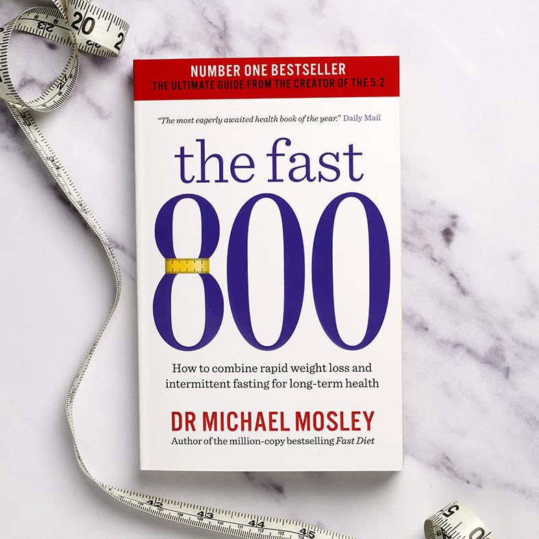 Inside page spread from The Fast 800 by Dr Michael Mosley showing intermittent fasting guidance