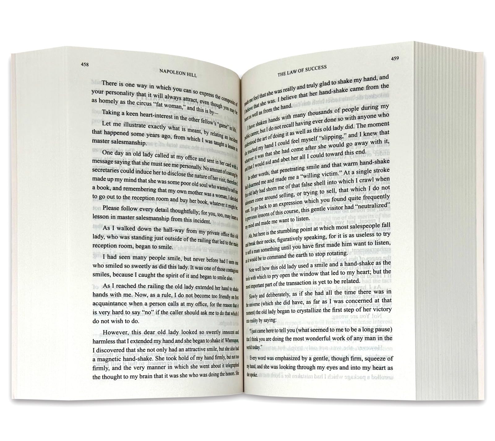 The Psychology of Success by Napoleon Hill paperback book, angled view showing spine and cover