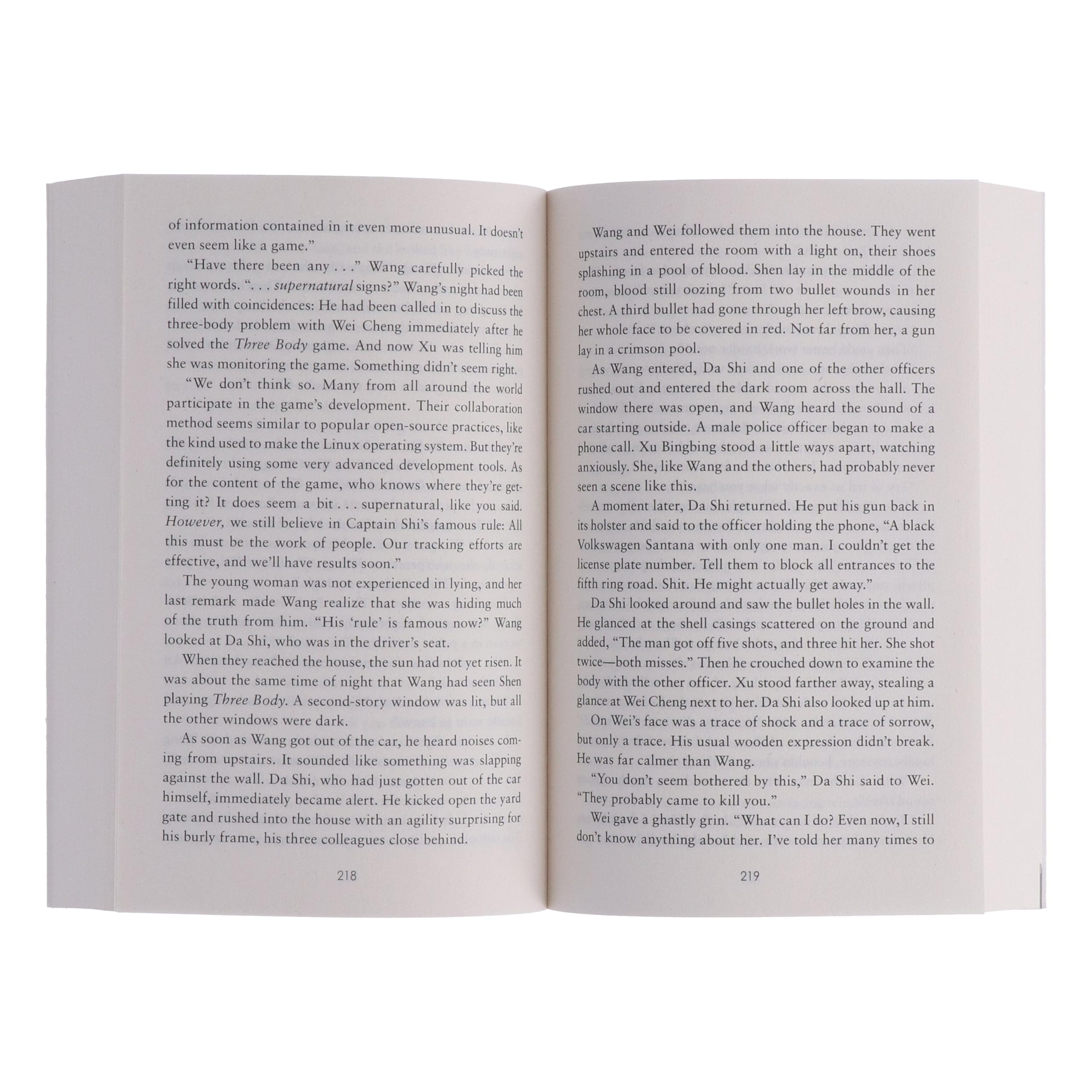 Angled view of the stacked Three-Body Problem paperback set highlighting cover artwork and book thickness