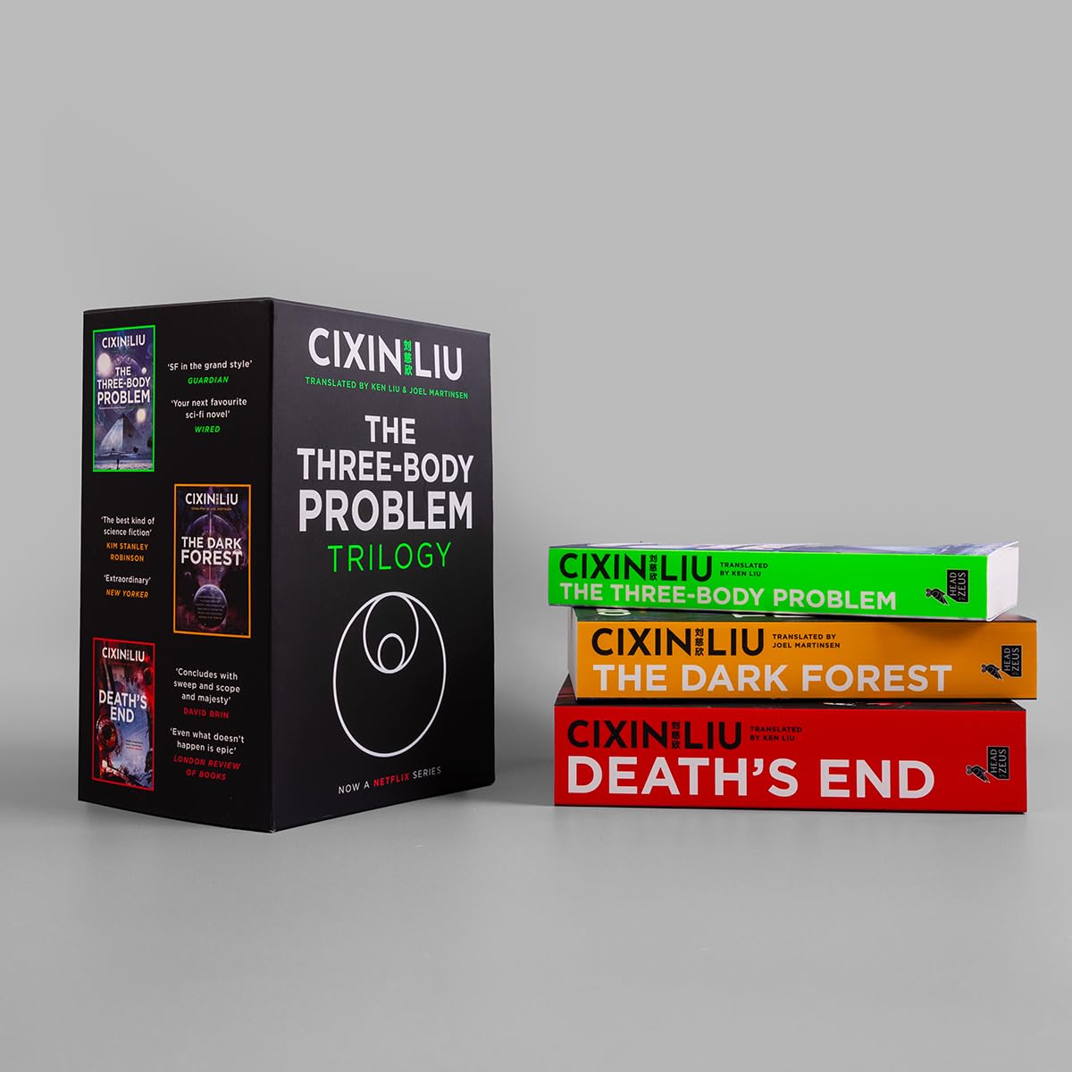 The Three-Body Problem, The Dark Forest, and Death's End paperback books shown fanned out together