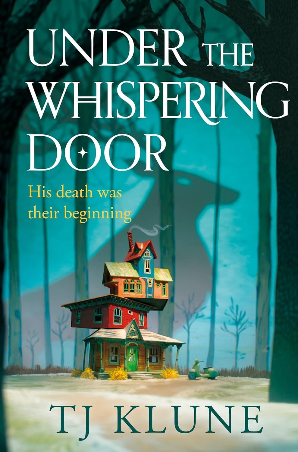 Under the Whispering Door and In the Lives of Puppets paperback covers shown together