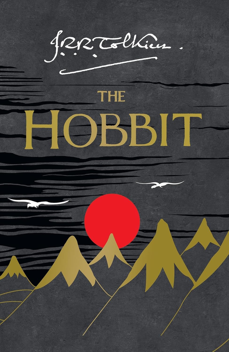 The Hobbit and The Lord of the Rings paperback books fanned out showing spines and page edges