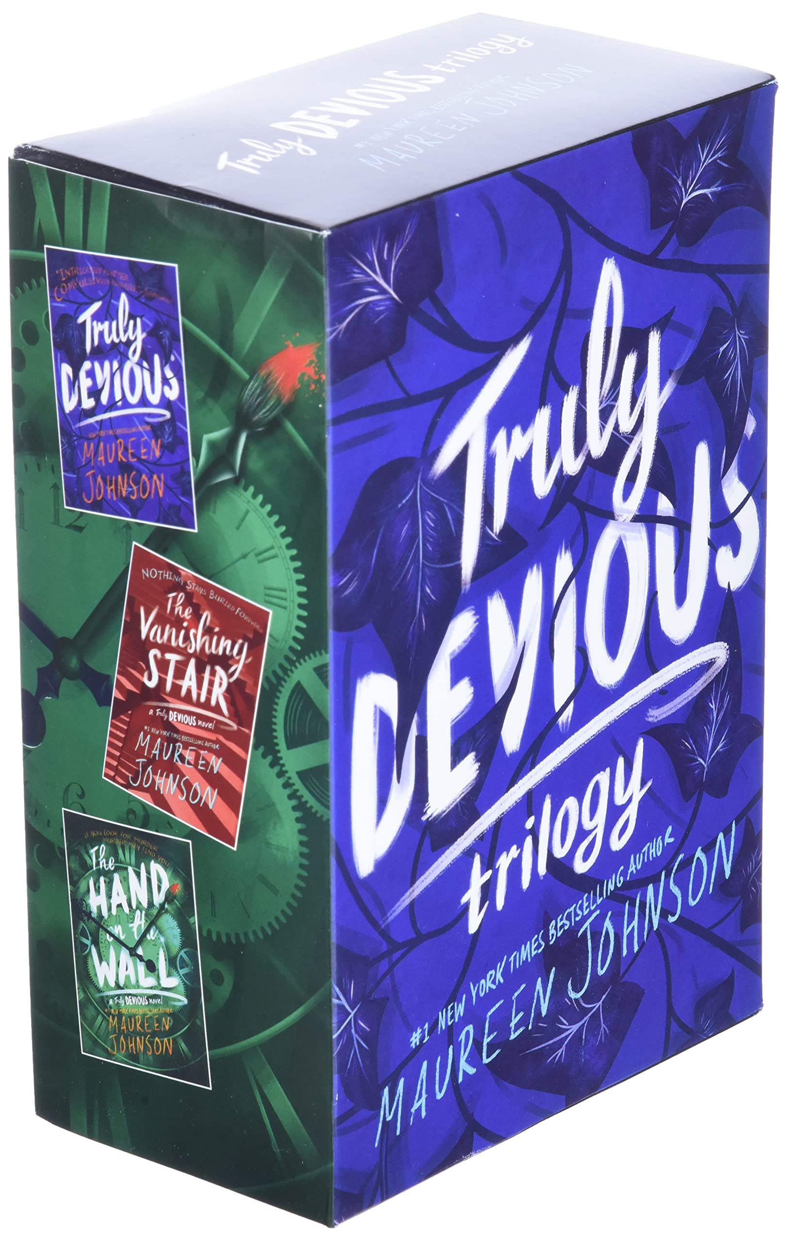 Back cover and spine detail of the Truly Devious paperback box set featuring Truly Devious, The Vanishing Stair, and The Hand on the Wall