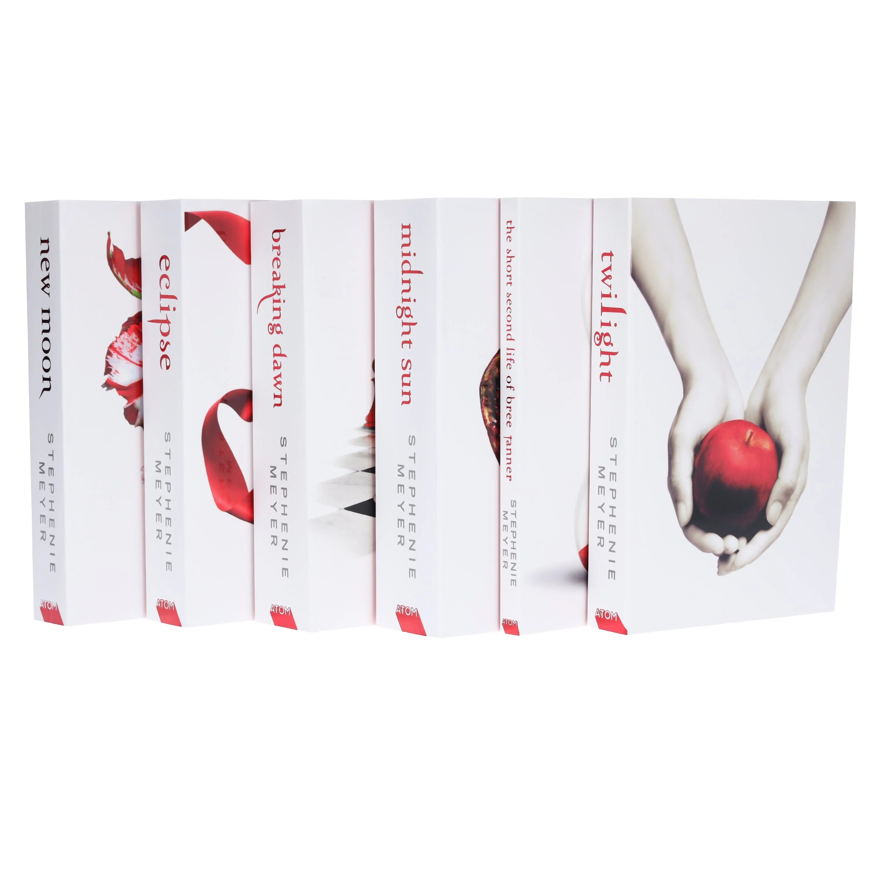 Stack of Twilight Saga paperback books displayed together showing the matching white cover design
