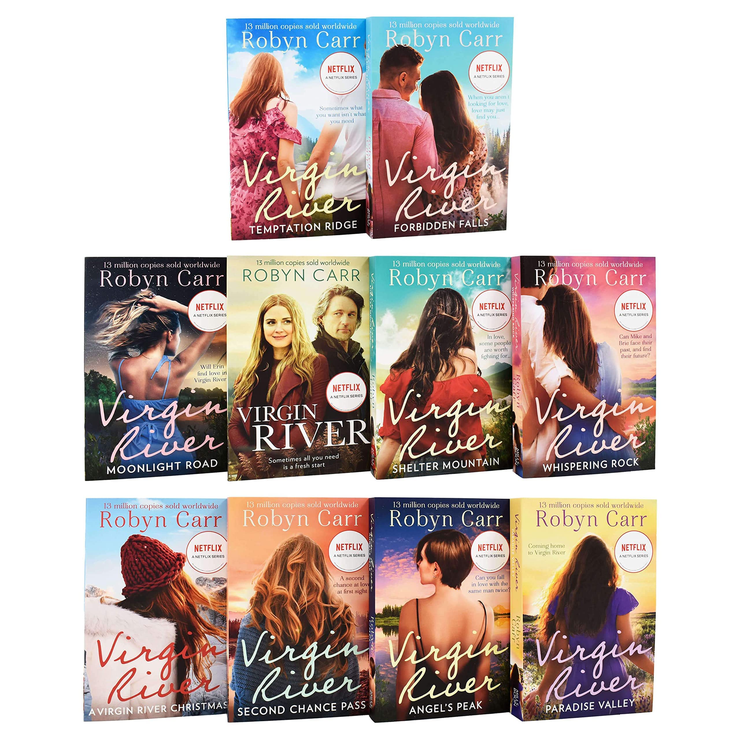 Close-up of Virgin River paperback book spines showing Shelter Mountain, Whispering Rock, and Second Chance Pass