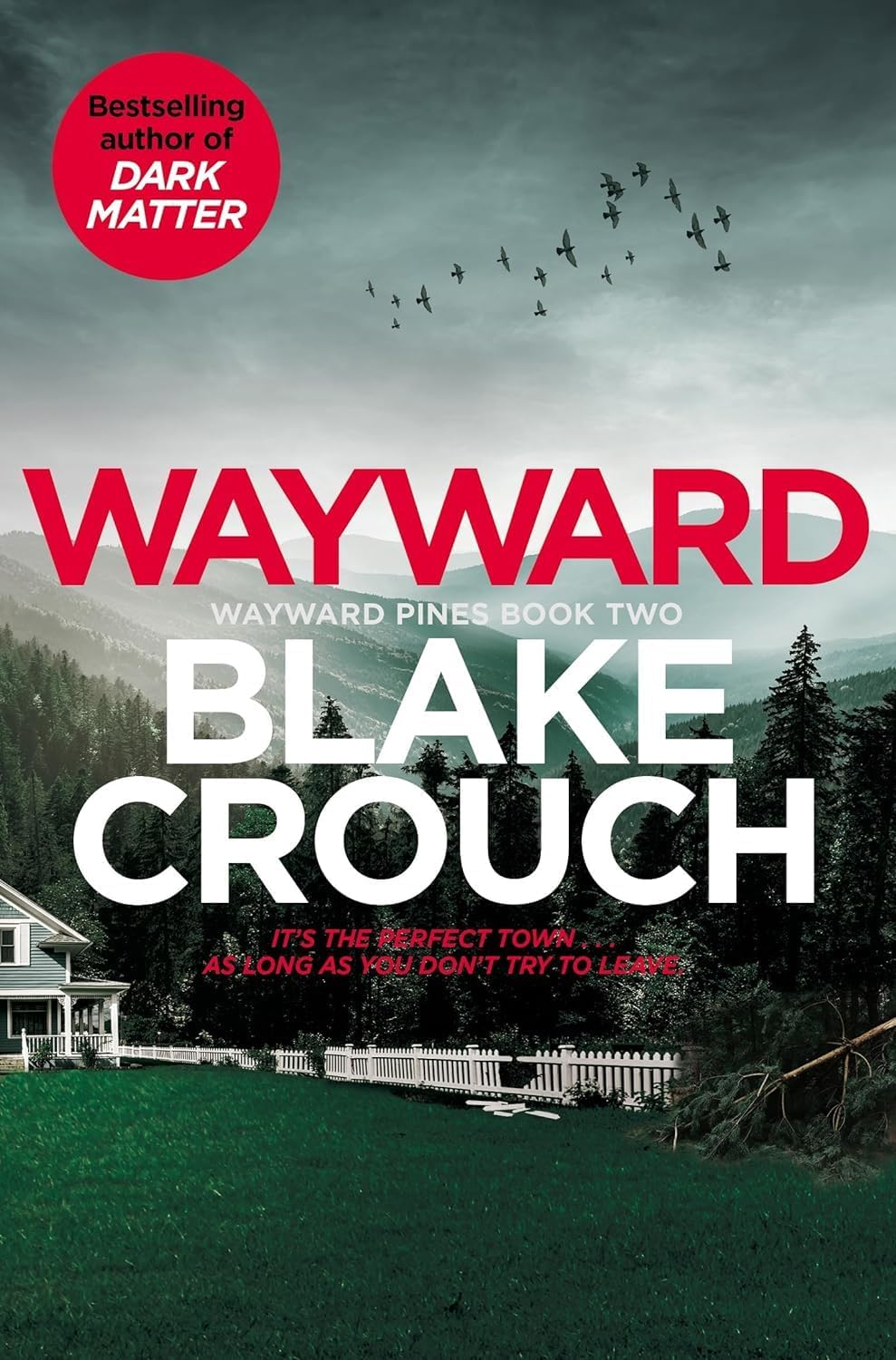 Close-up of the Wayward Pines Trilogy paperback covers by Blake Crouch, showing suspenseful cover artwork.