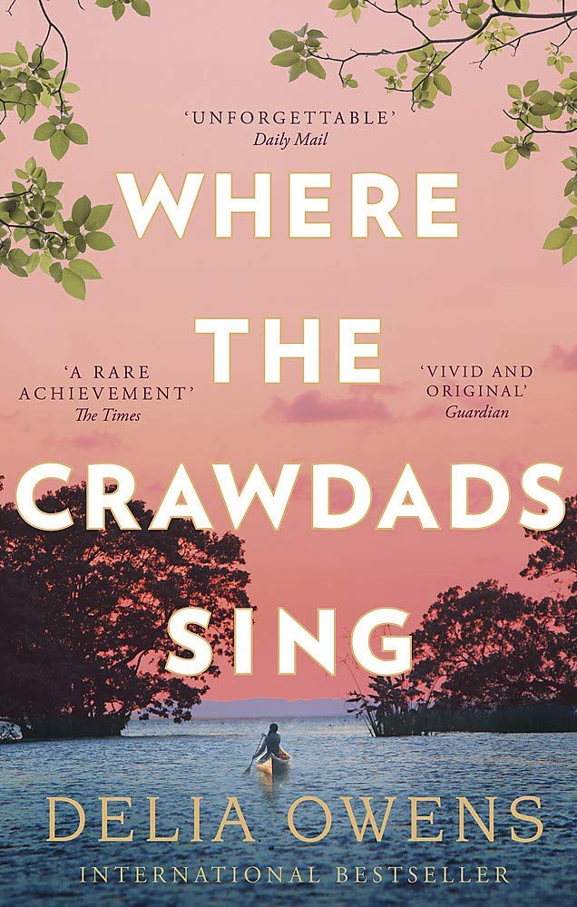 Where the Crawdads Sing paperback cover close-up showing Delia Owens' marsh-set literary fiction novel