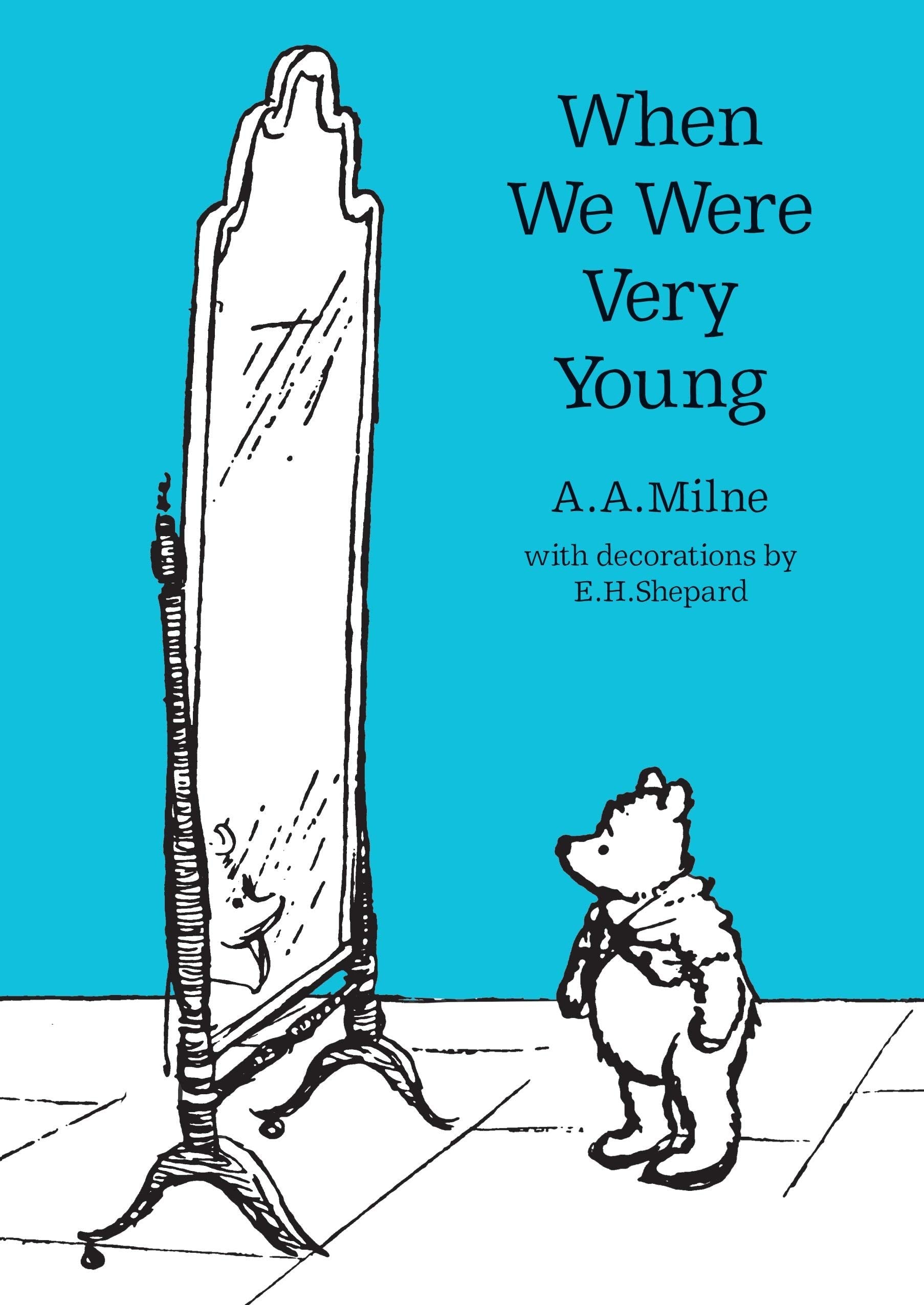Close-up of Winnie-the-Pooh and The House at Pooh Corner paperback covers with classic illustrations.