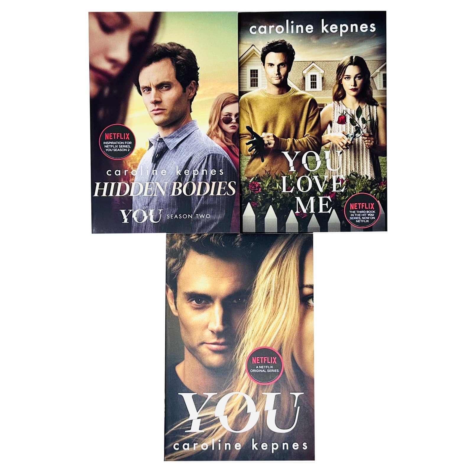 All three paperback books in the You Series by Caroline Kepnes fanned out to show individual cover art